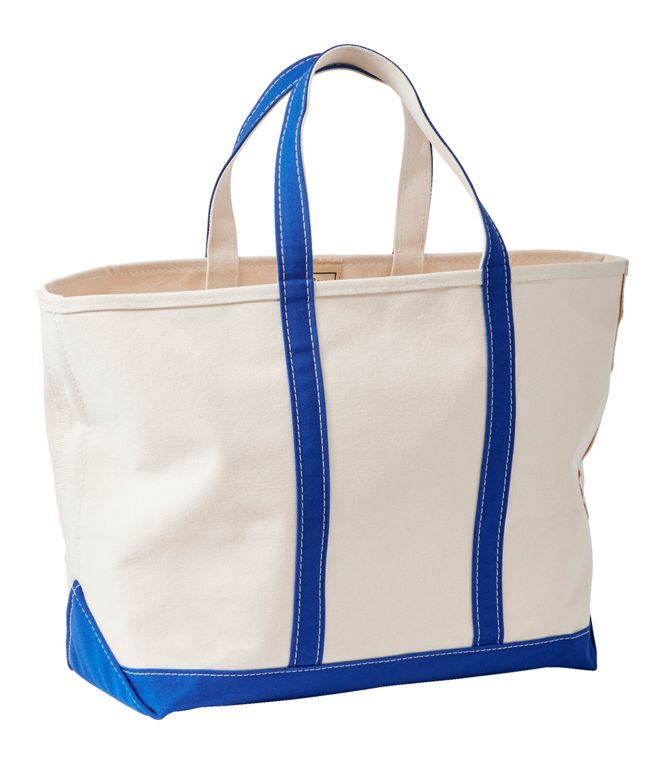 Canvas tote bag with blue accents on a white background