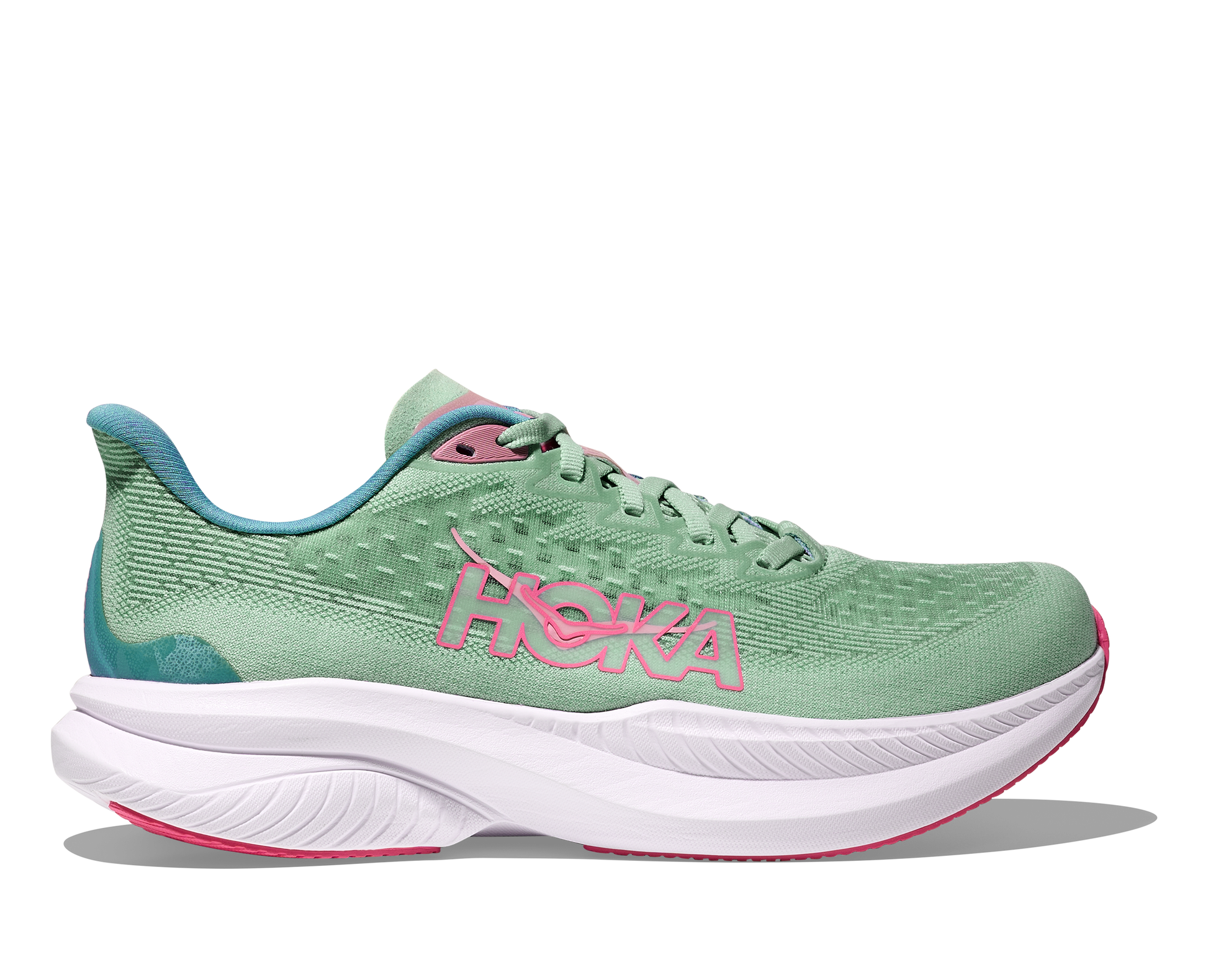Green running shoe with pink Hoka logo on a white background