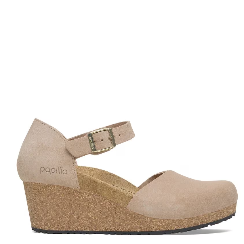 Beige wedge sandal with cork sole on a white background
