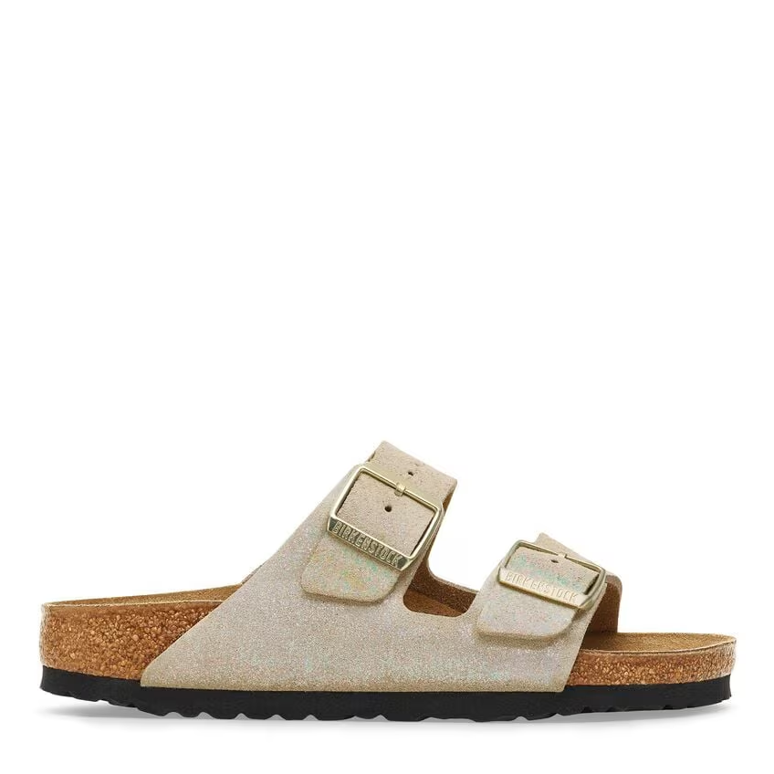 Beige sandal with cork sole on a white background