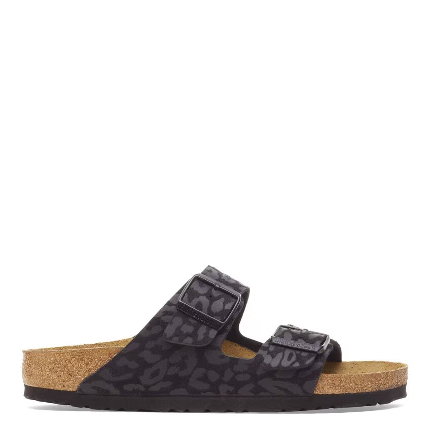 Black sandal with cork sole on a white background