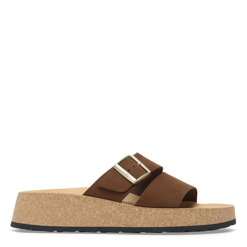 Brown sandal with cork platform on a white background