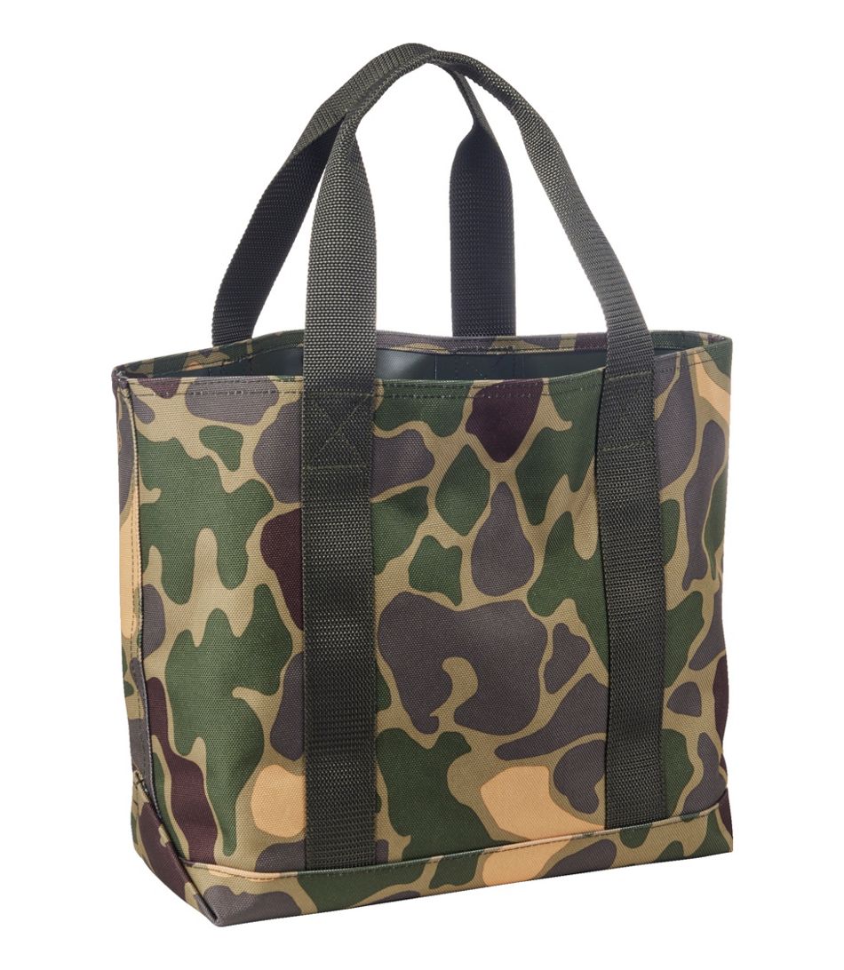 Camouflage tote bag with black handles on a white background