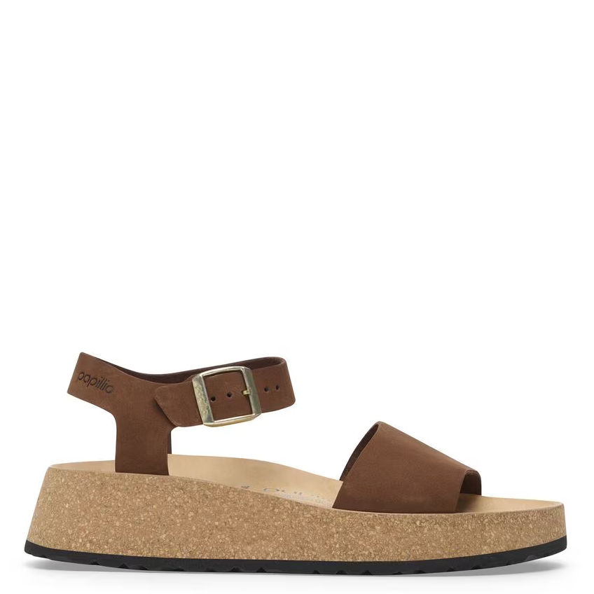 Brown sandal with cork platform on a white background