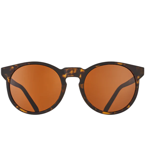 Sunglasses with tortoiseshell frame and orange lenses on a white background