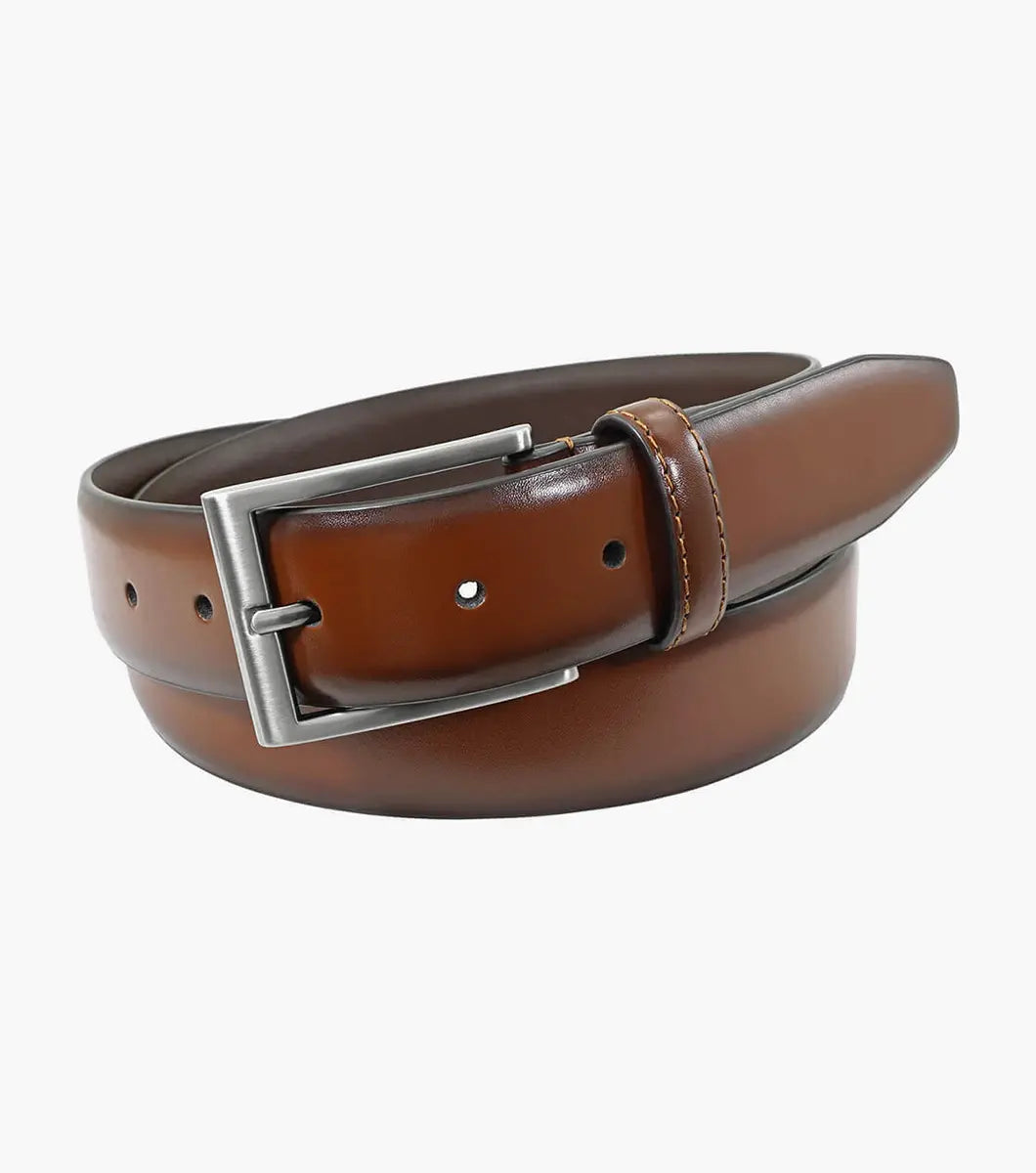 Brown leather belt with silver buckle on a white background
