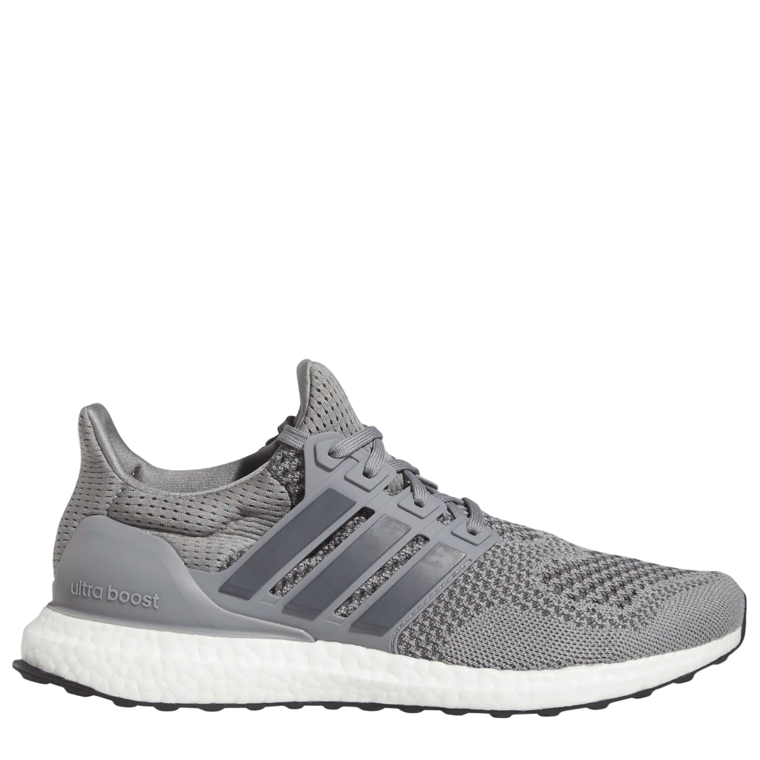 Gray athletic shoe with white sole on a light gray background