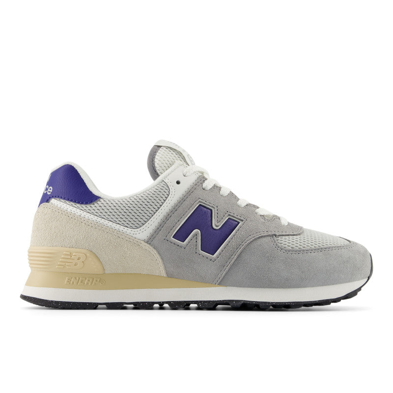Gray sneaker with purple 'N' logo on a white background