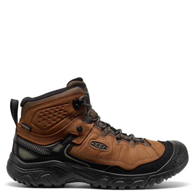 A brown and black Keen mid-cut hiking boot shown from the side profile against a plain white background.