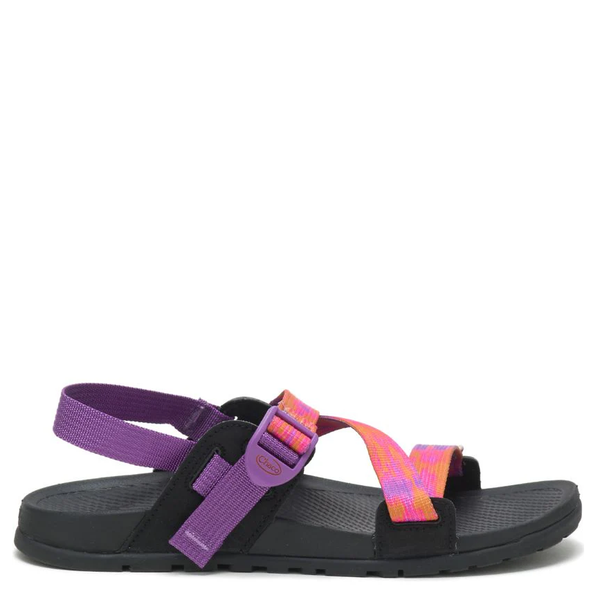 Black sandal with purple and multicolor straps on a white background