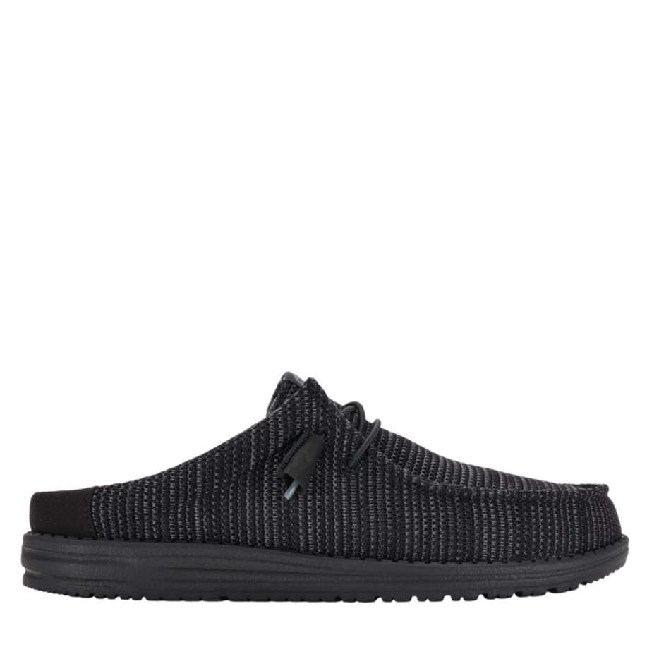 Black knit slip-on shoe on a white background