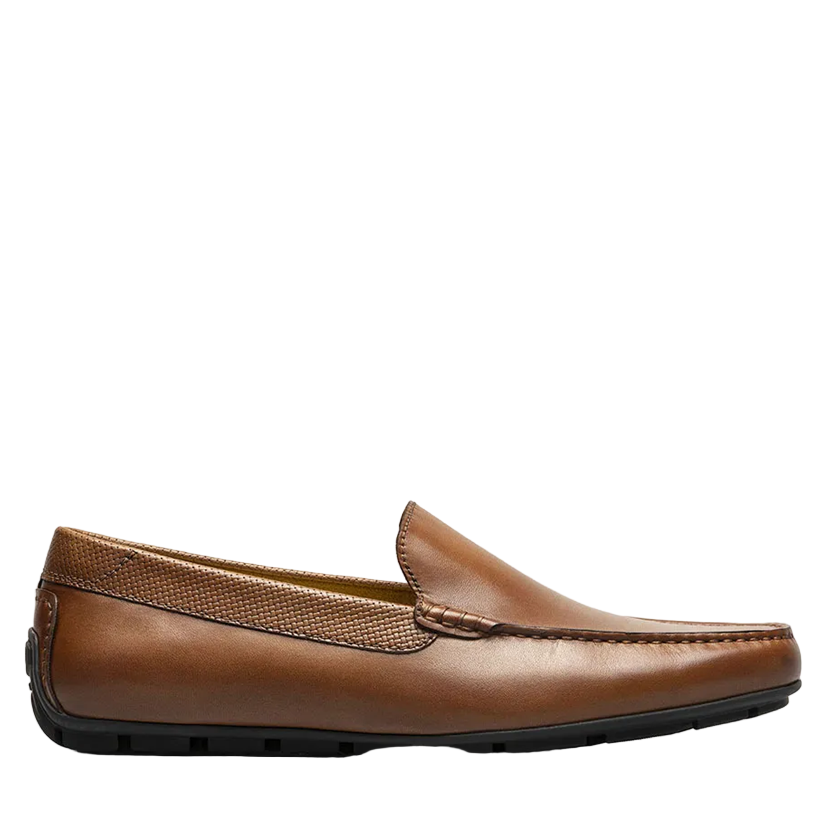 Brown loafer shoe on a white background