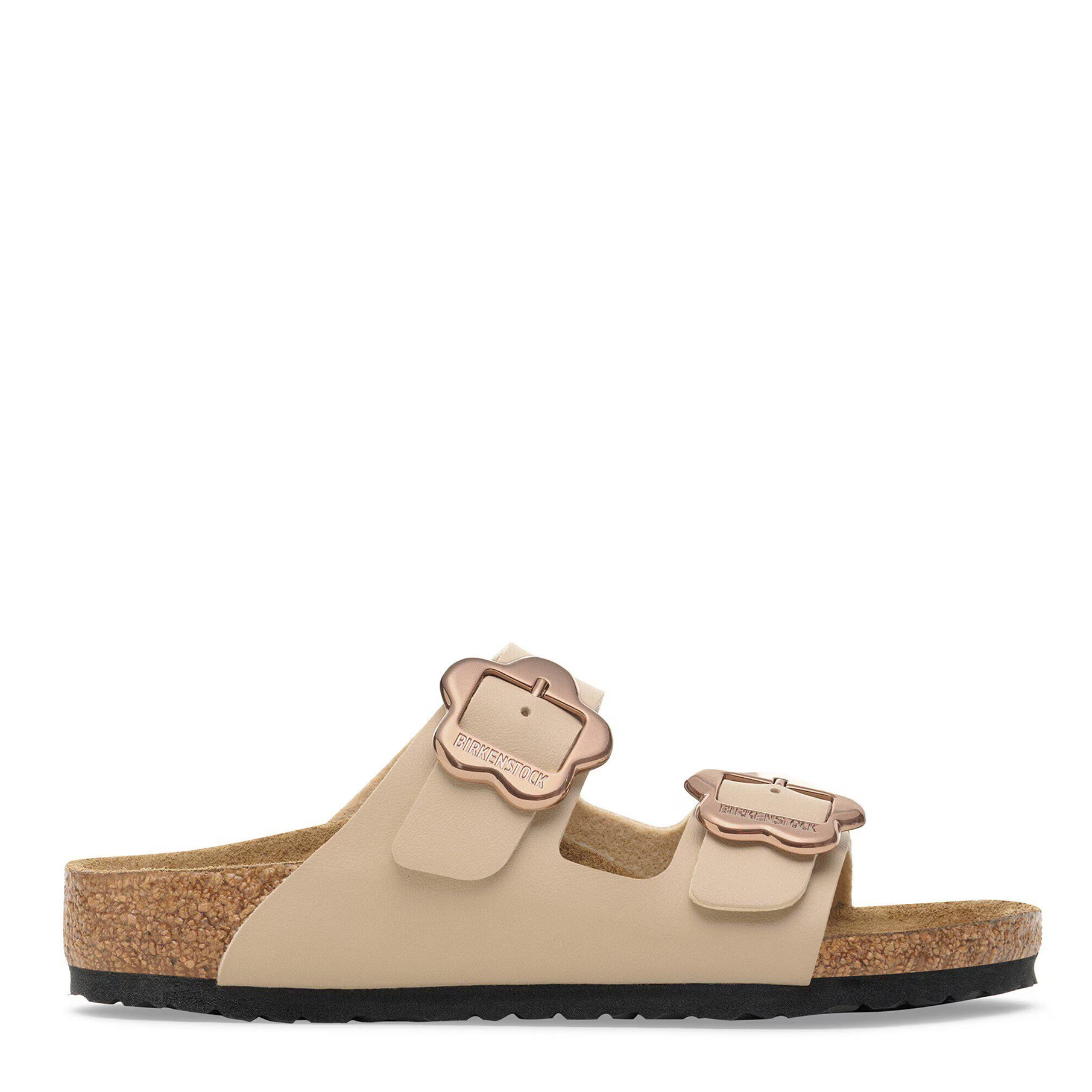 Beige sandal with two buckles on a white background