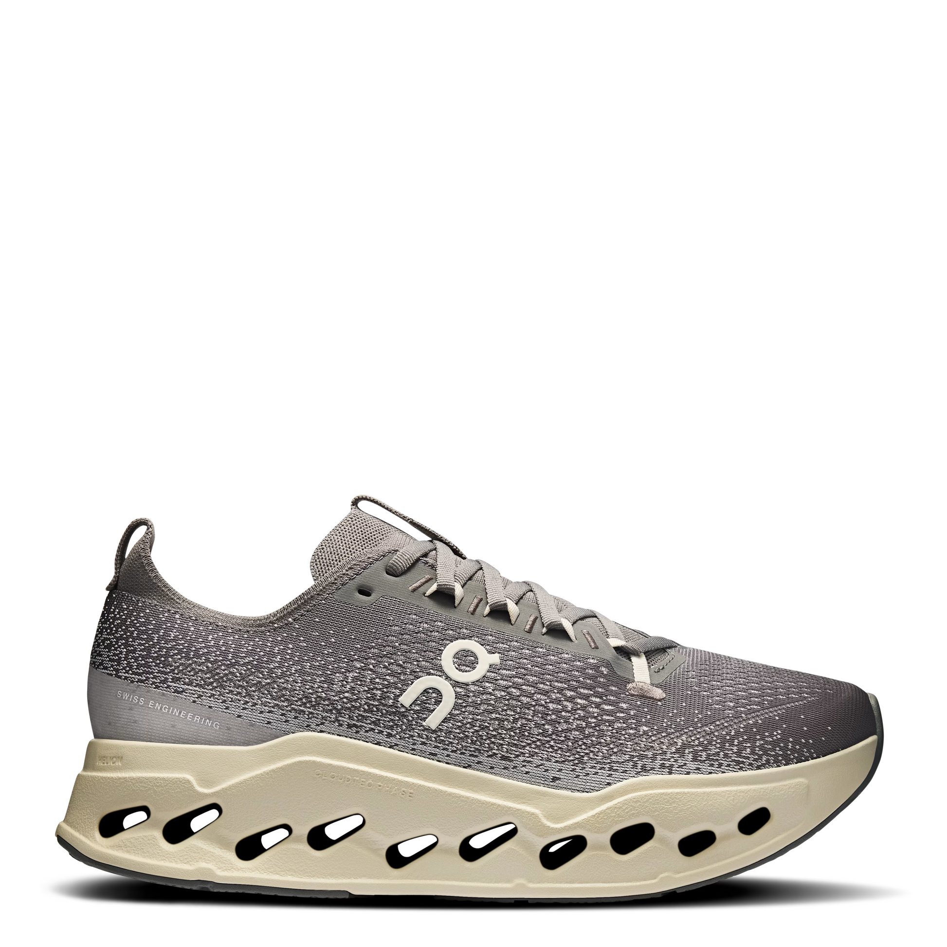 Gray running shoe with a unique sole design on a white background