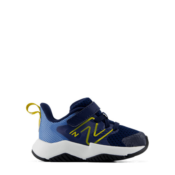 A single New Balance toddler sneaker in navy blue with a light blue mesh side, yellow logo accents, and a white midsole, shown against a plain white background.