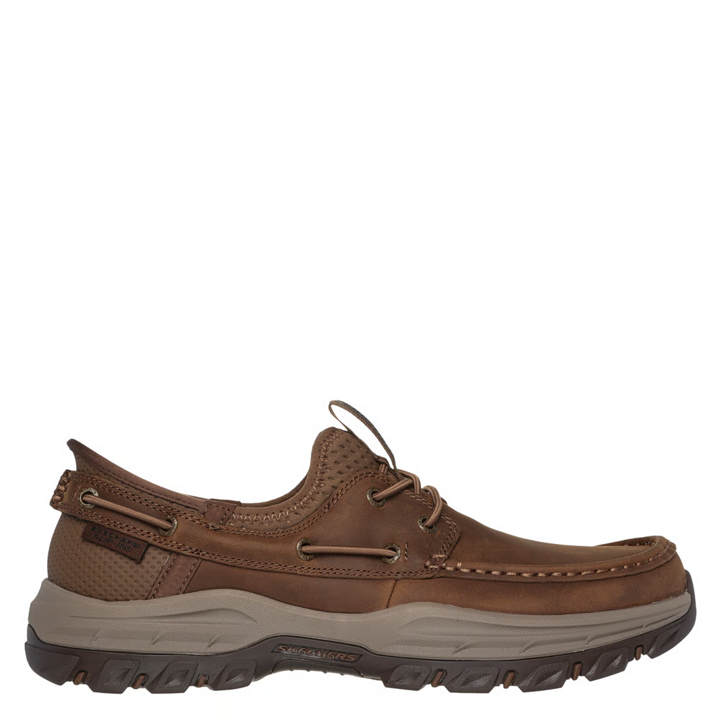 Brown leather shoe on a white background