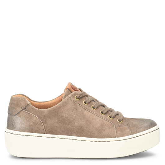 Brown suede sneaker on a white background