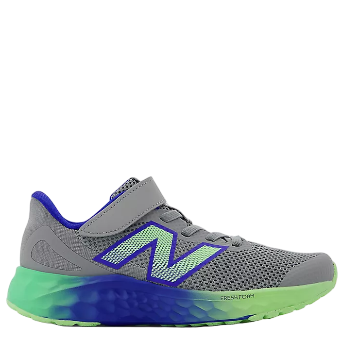 Gray running shoe with green and blue sole on a white background