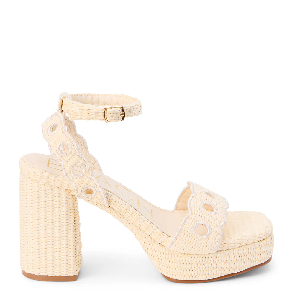 Beige woven sandal with a block heel on a white background