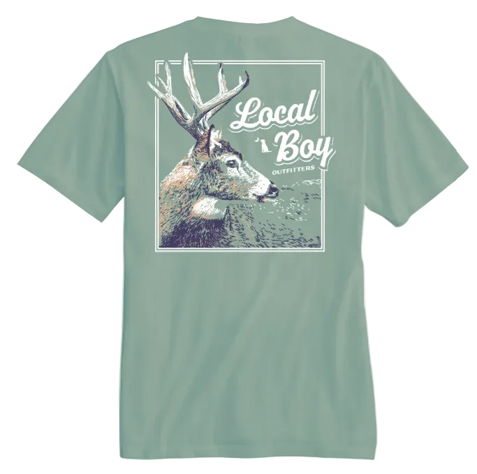 A bay short-sleeve t-shirt shown from the back, featuring a large graphic print of a deer and the text 'LOCAL BOY OUTFITTERS' in white. 