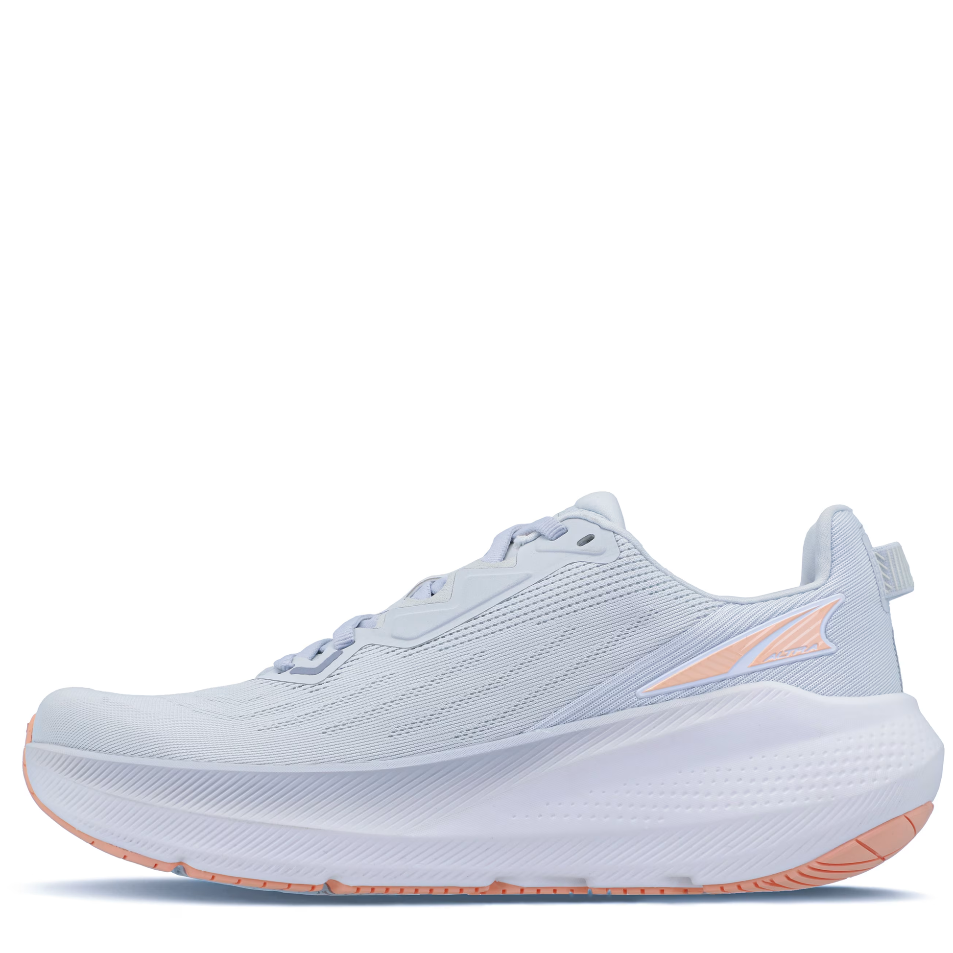 A pair of women's Altra running shoes in white color with a low heel and cushioned midsole.