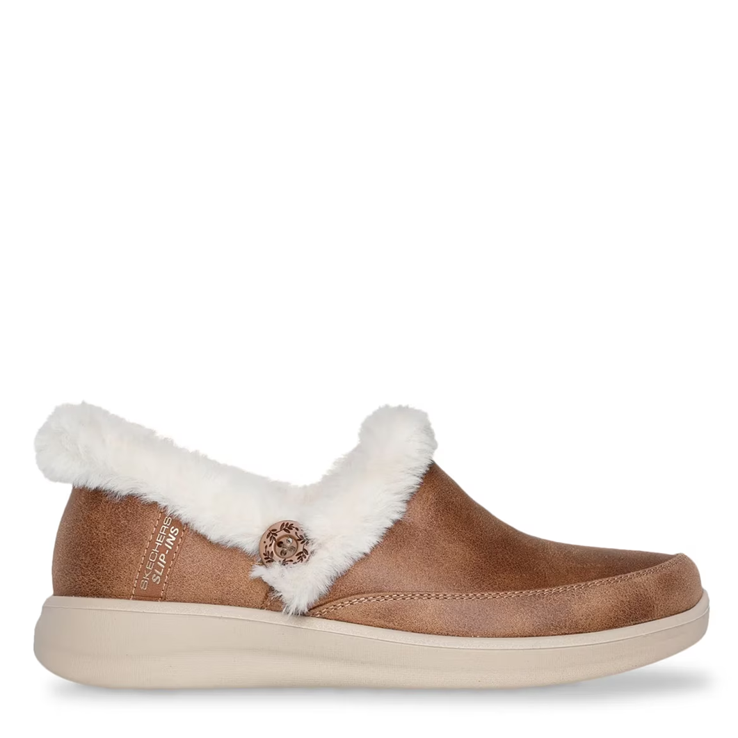 Brown slip-on shoe with white fur lining on a white background