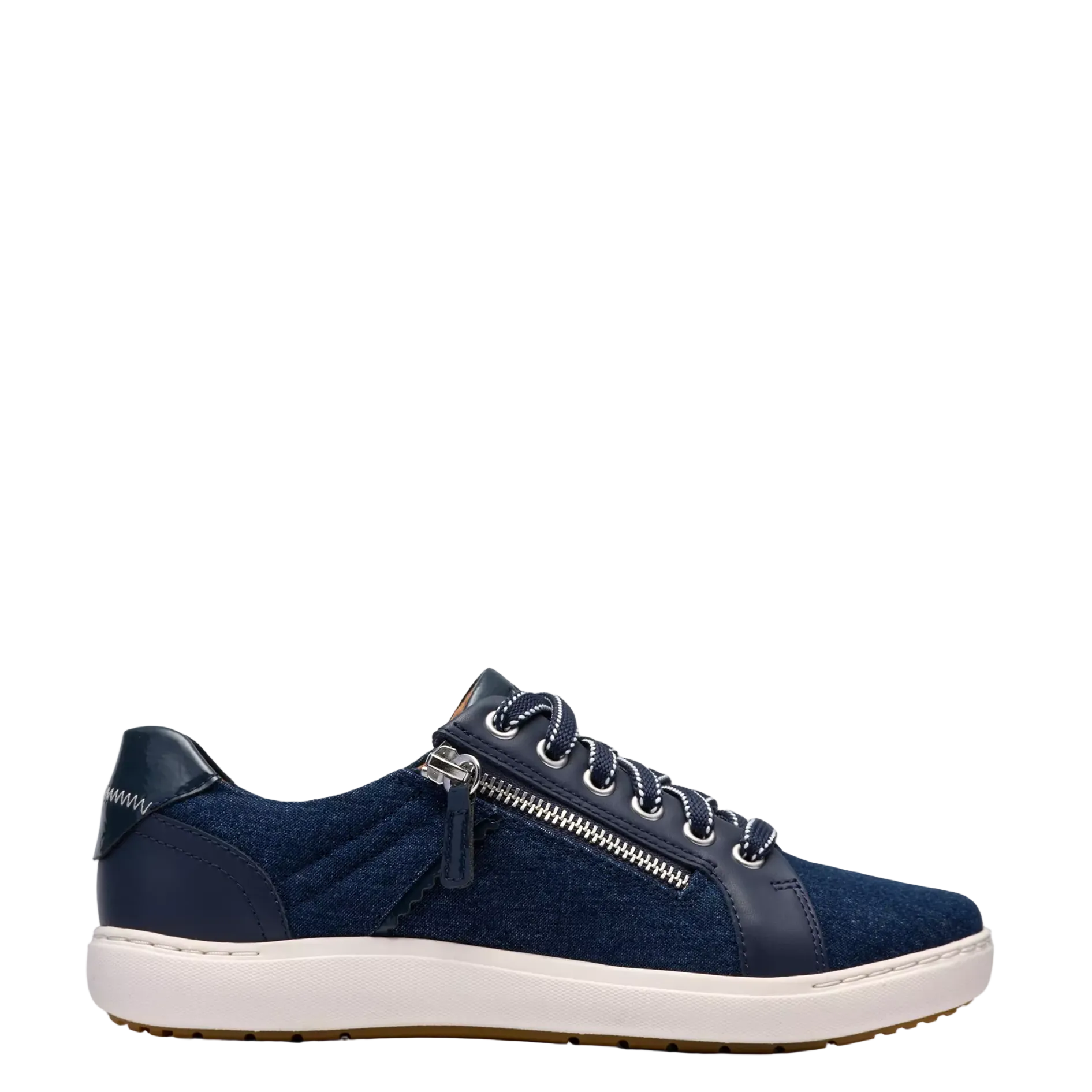Navy blue sneaker with a white sole on a light gray background