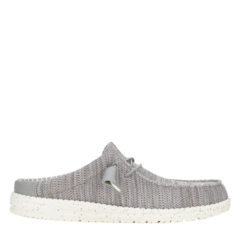 Gray knit shoe with white sole on a white background