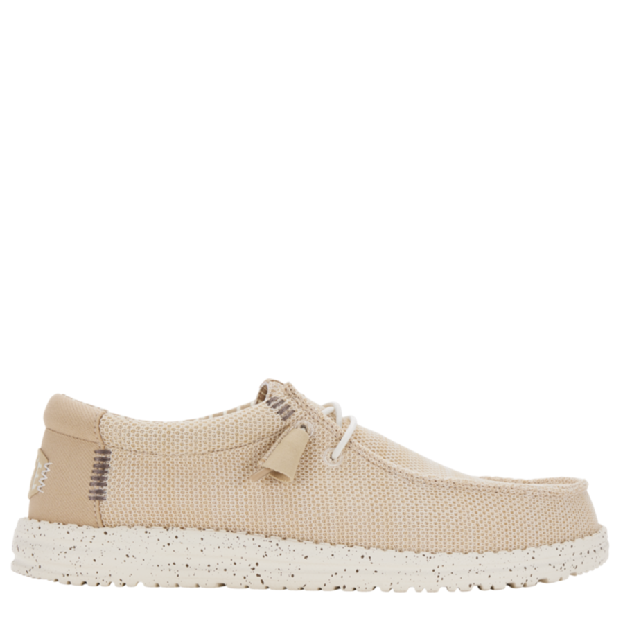 Beige sneaker with white sole on a white background