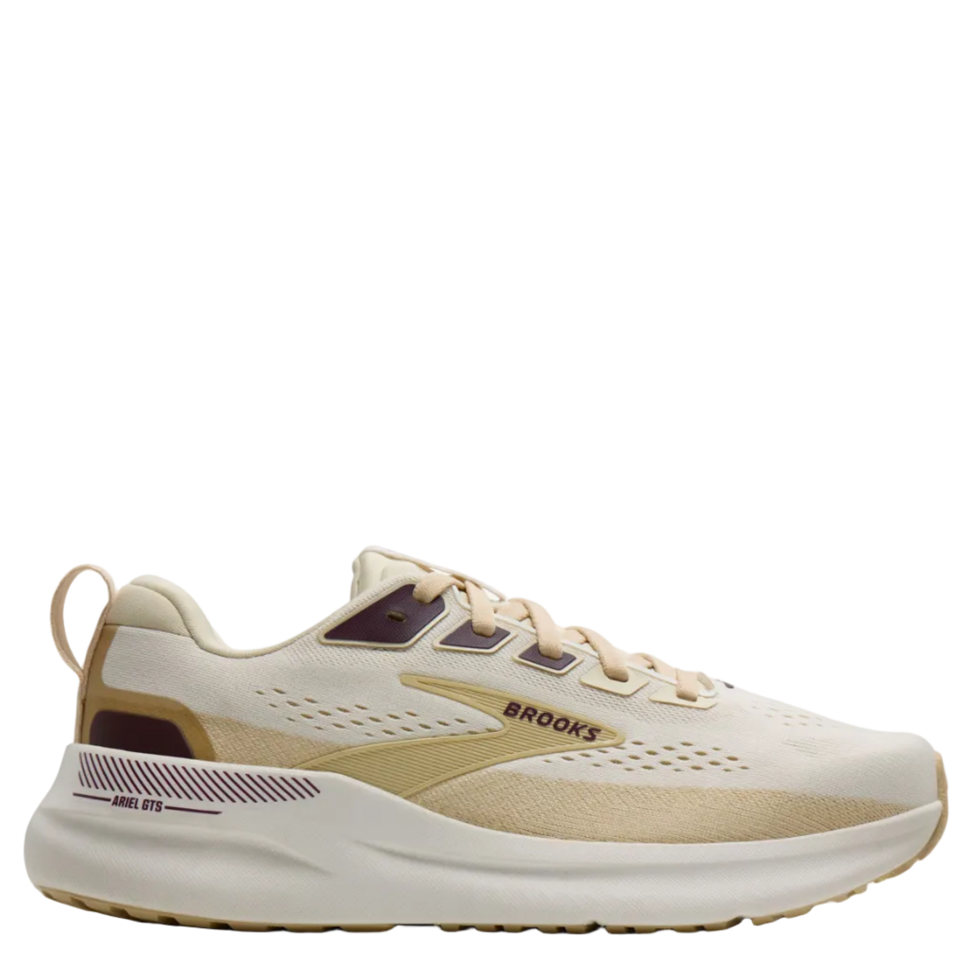 Beige running shoe with 'Brooks' branding on a white background