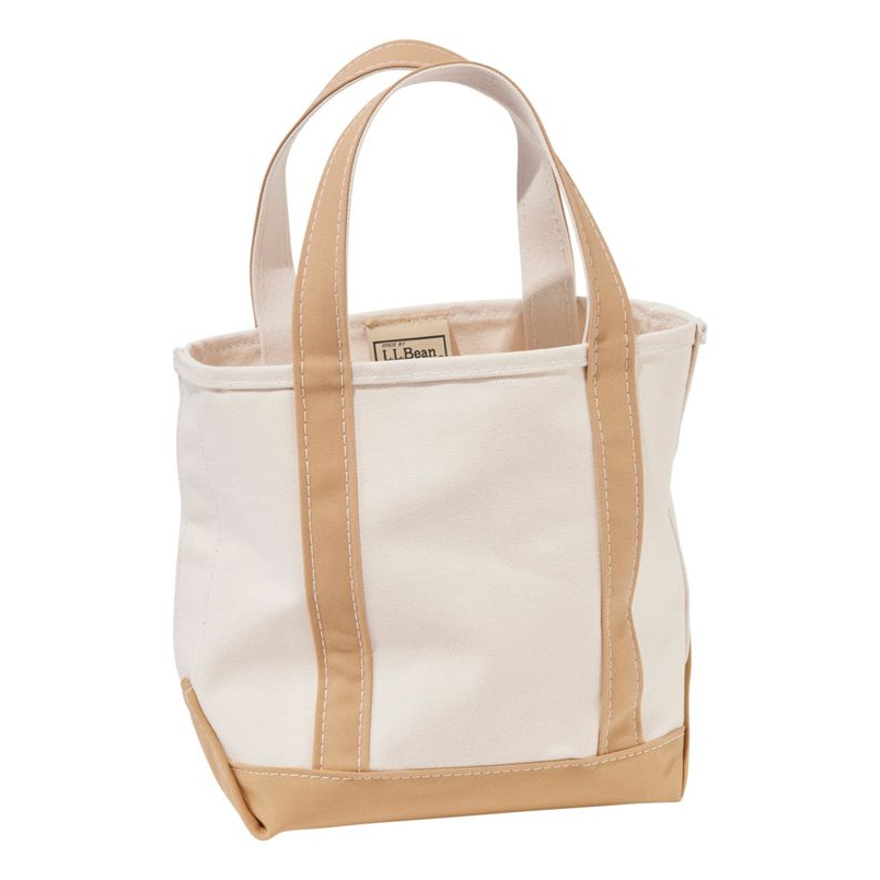 Canvas tote bag with beige handles and trim on a white background