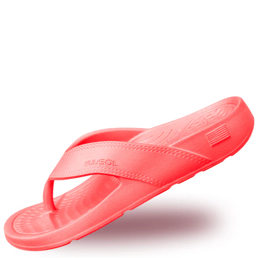 Coral sandal on a white background