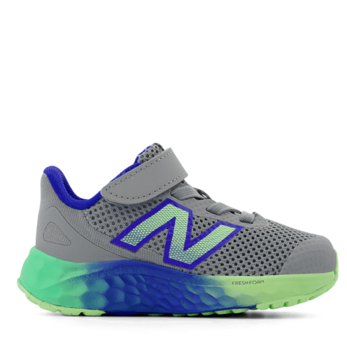 Gray and green sneaker with blue accents on a white background