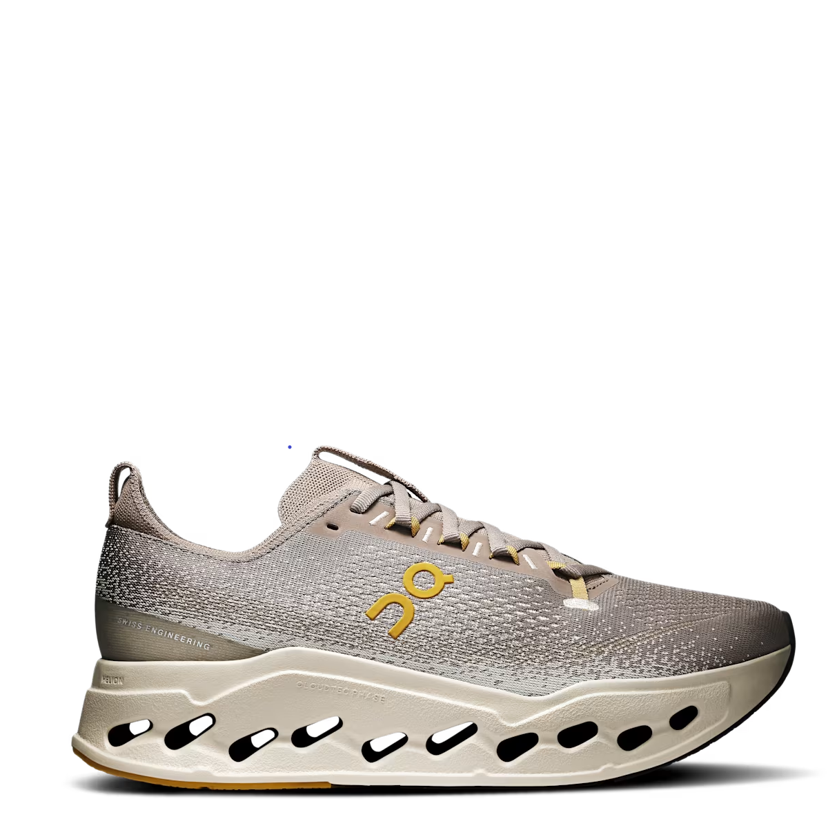Gray and beige sneaker with a yellow logo on a white background