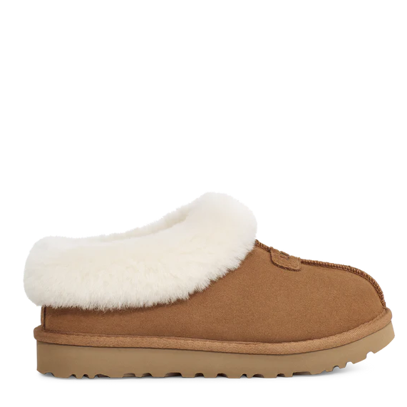 Brown slipper with white fur lining on a white background