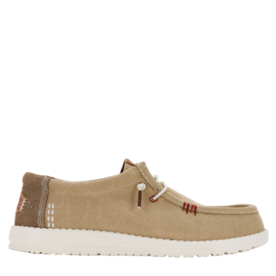 Beige casual shoe on a white background