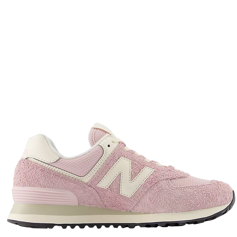 Pink sneaker with white accents on a light gray background
