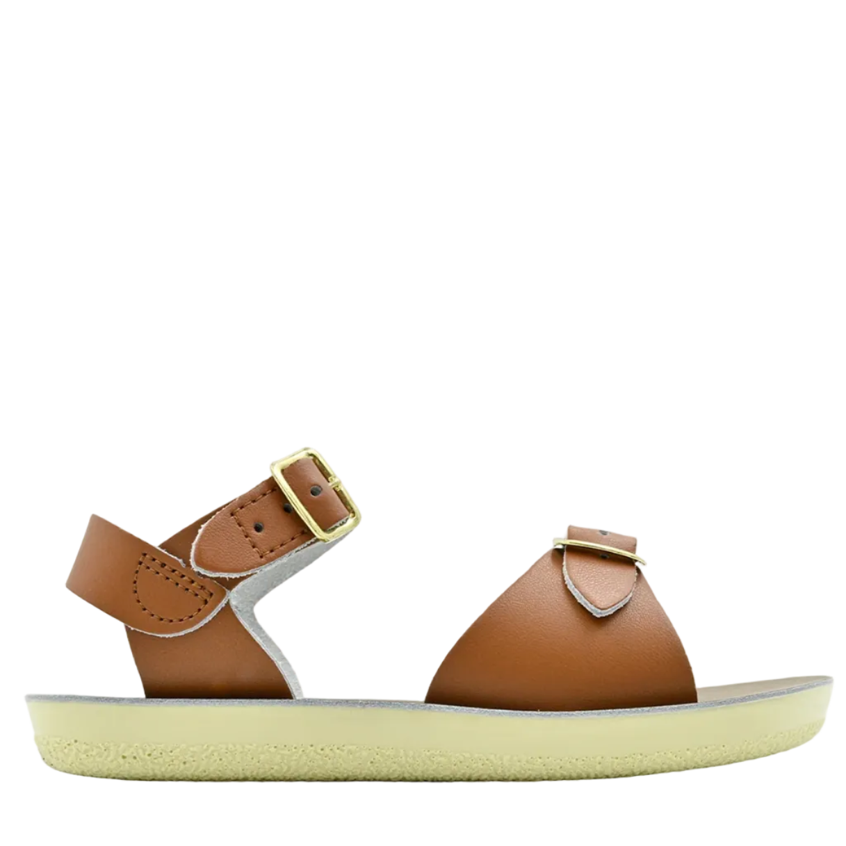 Brown sandal with a white sole on a light gray background