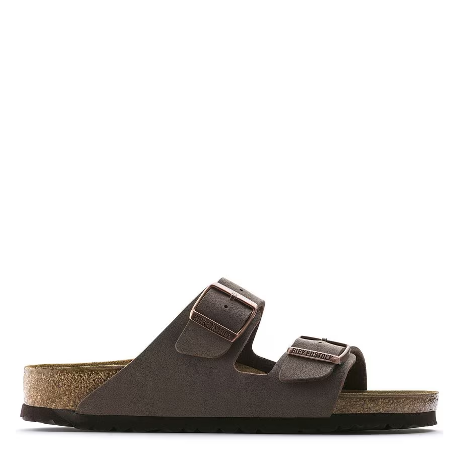 Brown sandal with a buckle on a white background