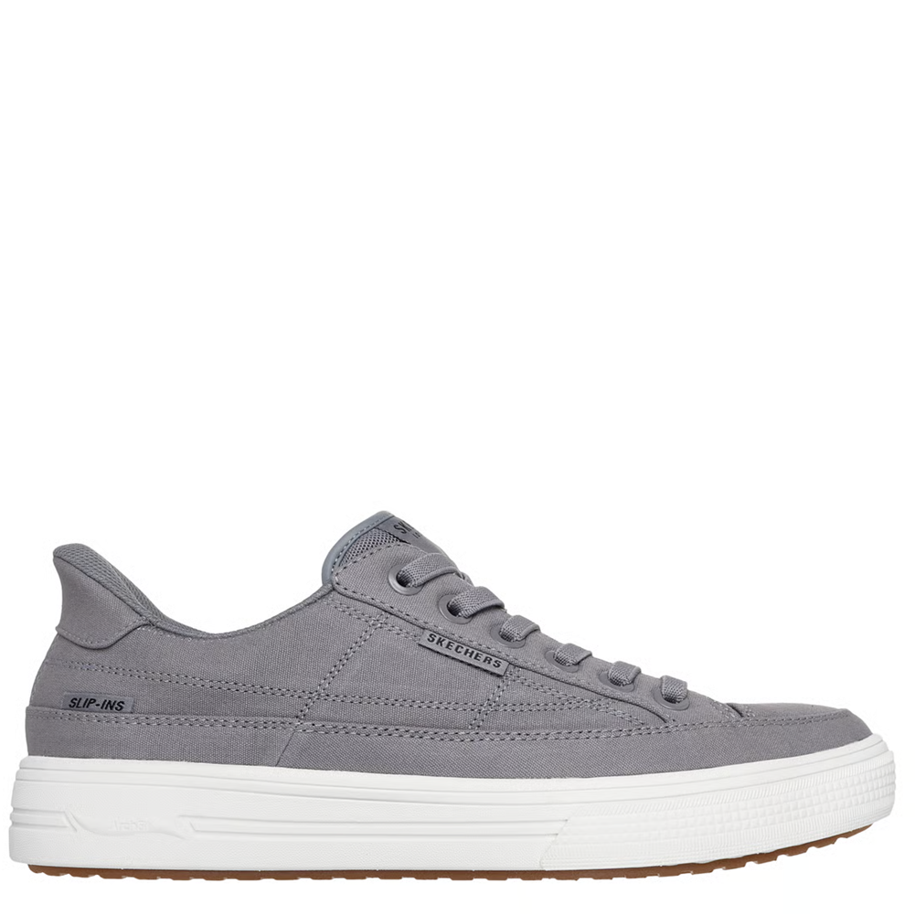 Gray sneaker with white sole on a white background