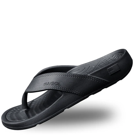 Black sandal with 'KUULAA' branding on a white background