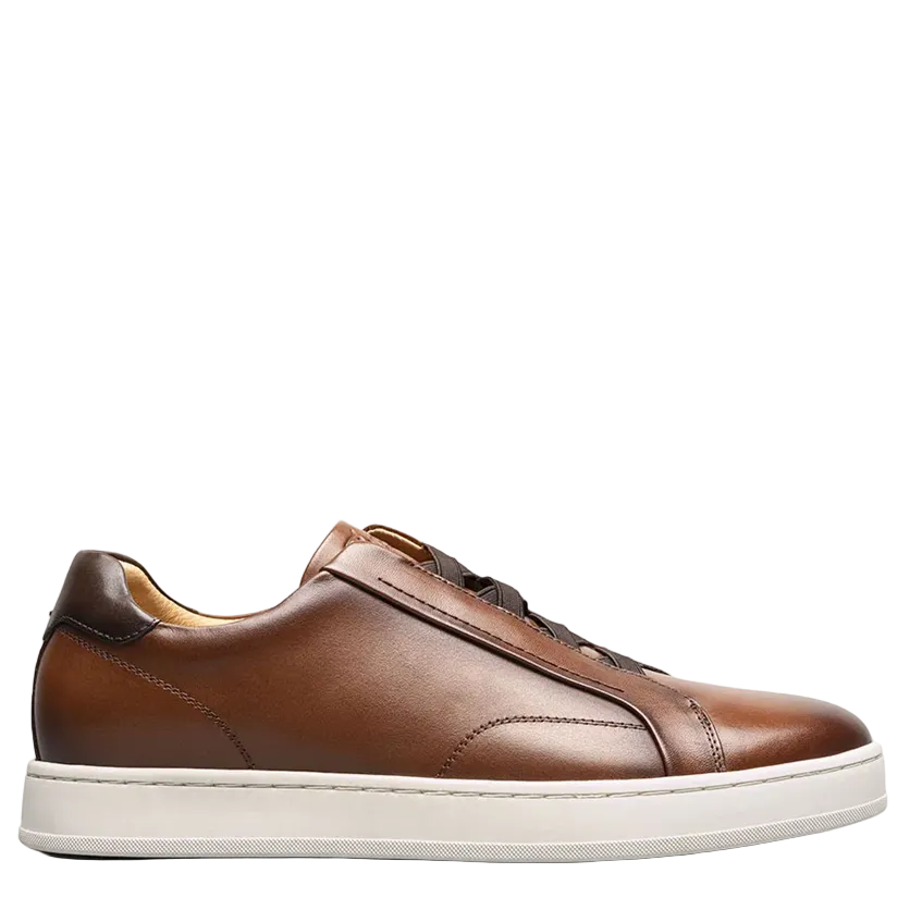 Brown leather sneaker on a white background