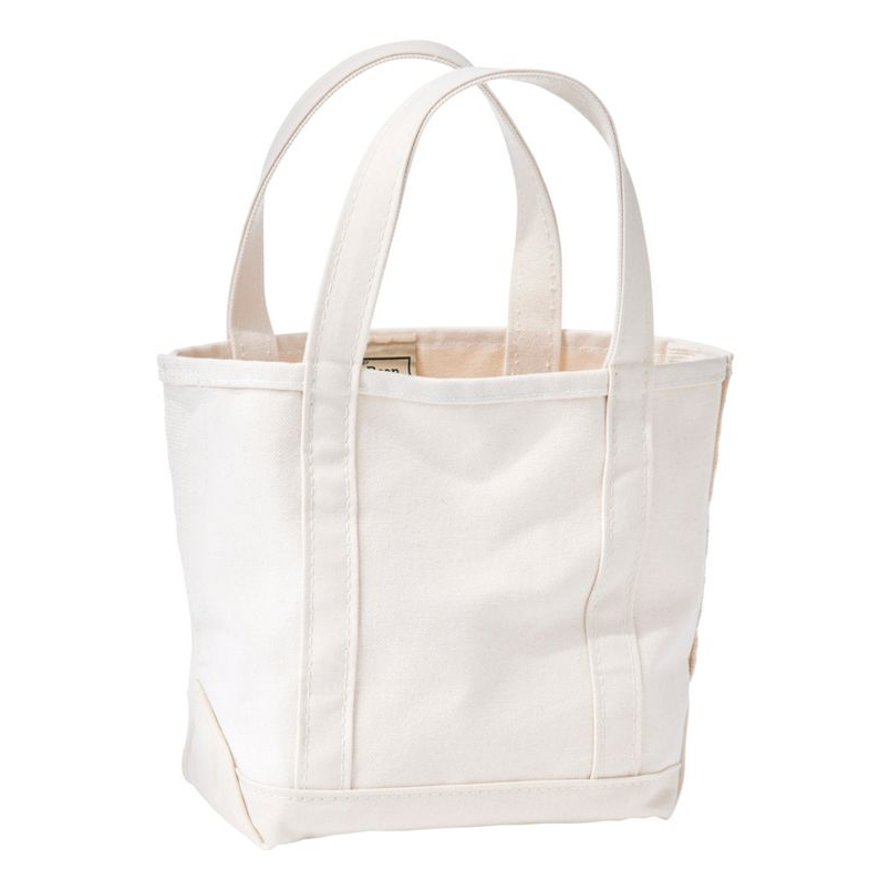 White tote bag with handles on a white background
