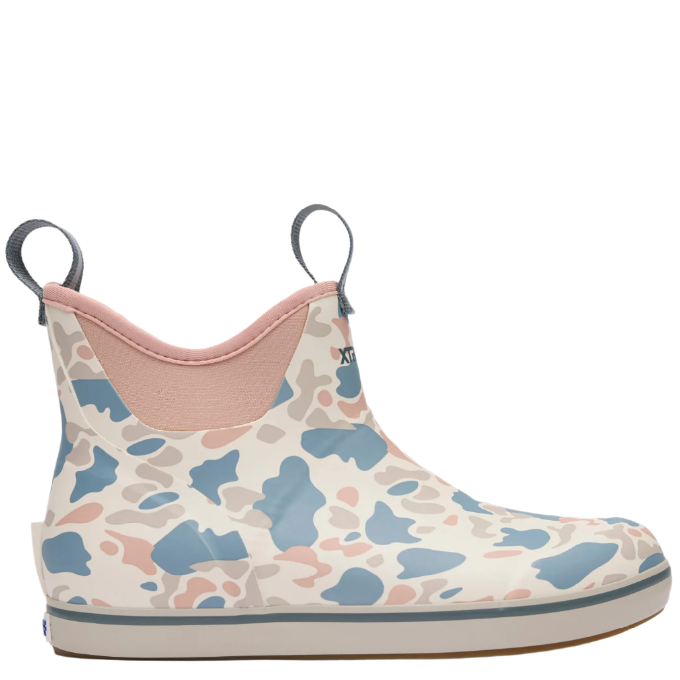 Camo-patterned rain boot with pink interior on a white background