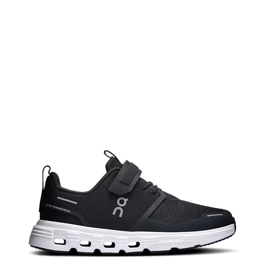 A black On running shoe with a hook-and-loop strap and a thick white sole, shown from the side against a plain white background.