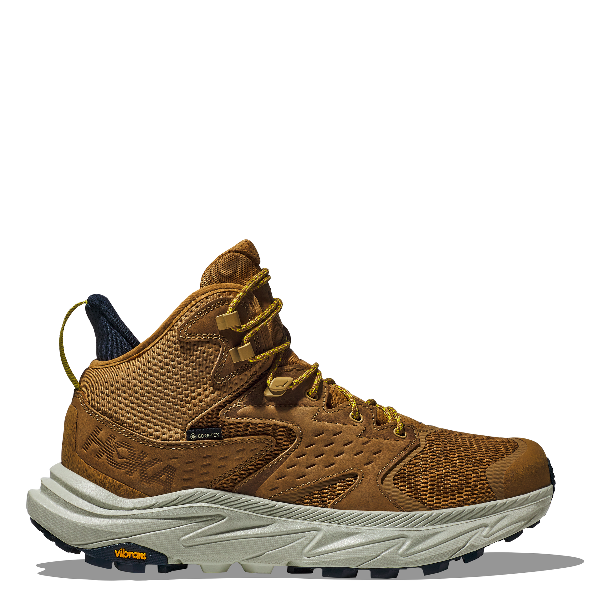 A pair of brown Hoka Anacapa 2 Mid GTX hiking boots with a gray midsole and yellow accents.