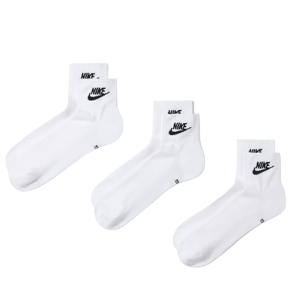 Three pairs of white Nike crew socks arranged diagonally on a clean white background, each showing the black Nike logo and wordmark on the cuff.