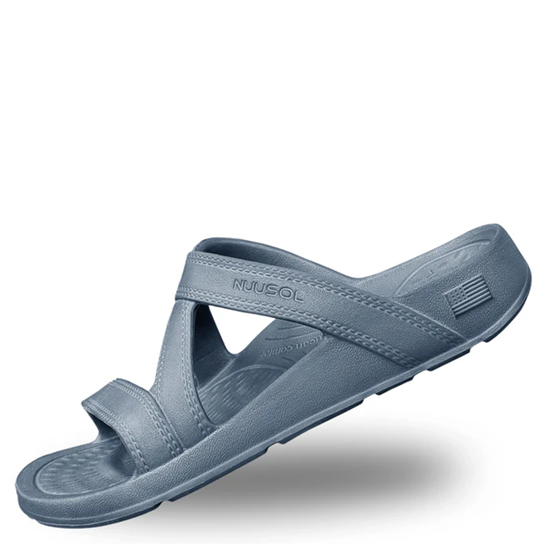 Blue sandal with 'KUUKOL' branding on a white background