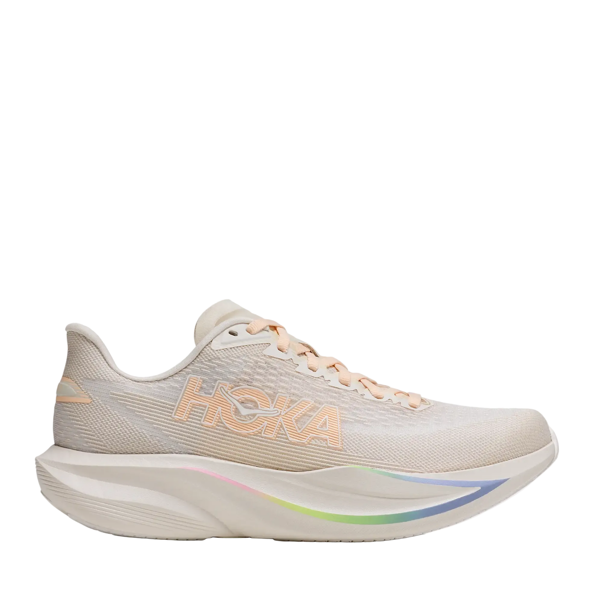 A Hoka running shoe in light beige with peach-colored branding and laces, featuring a white midsole with a subtle iridescent rainbow accent, shown against a plain white background.