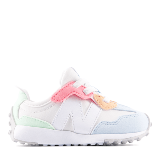 White children's sneaker with pink and green accents on a white background